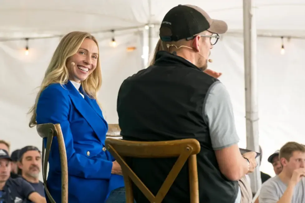 Mariah Miller of AWS smiles next to LoanPro's Colin Terry during the agentic AI in lending panel at Salt Flats Summit 2026